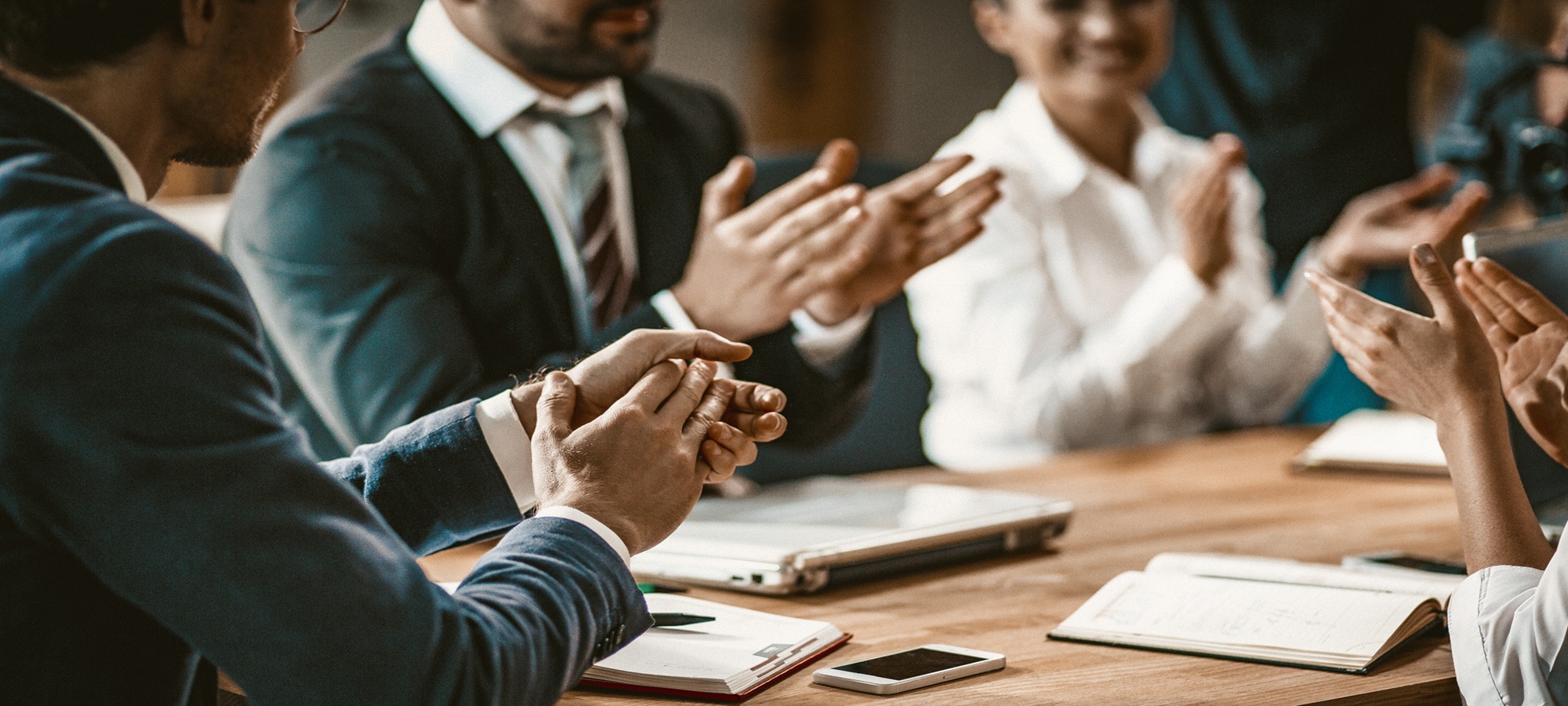 Business People Applauds After Successful Brainstorming